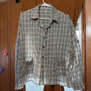 Two long sleeve blouse, size large.